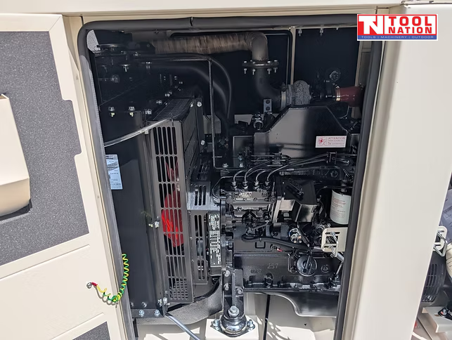 Rear view of the generator with both rear access doors open, showing internal engine and alternator components.