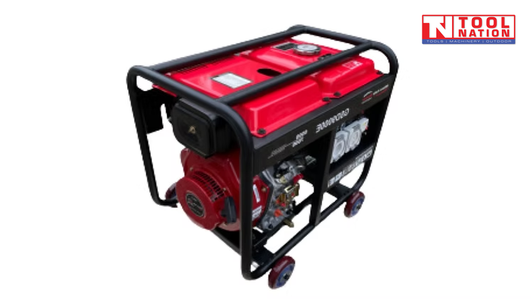 Angled top-front view of red open-frame diesel generator with black roll cage, fuel tank, control panel and wheels.