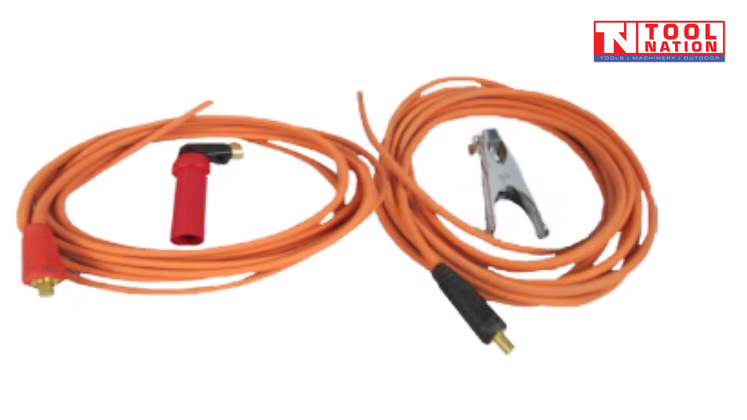 Welding leads with electrode holder and earth clamp laid out on white background.