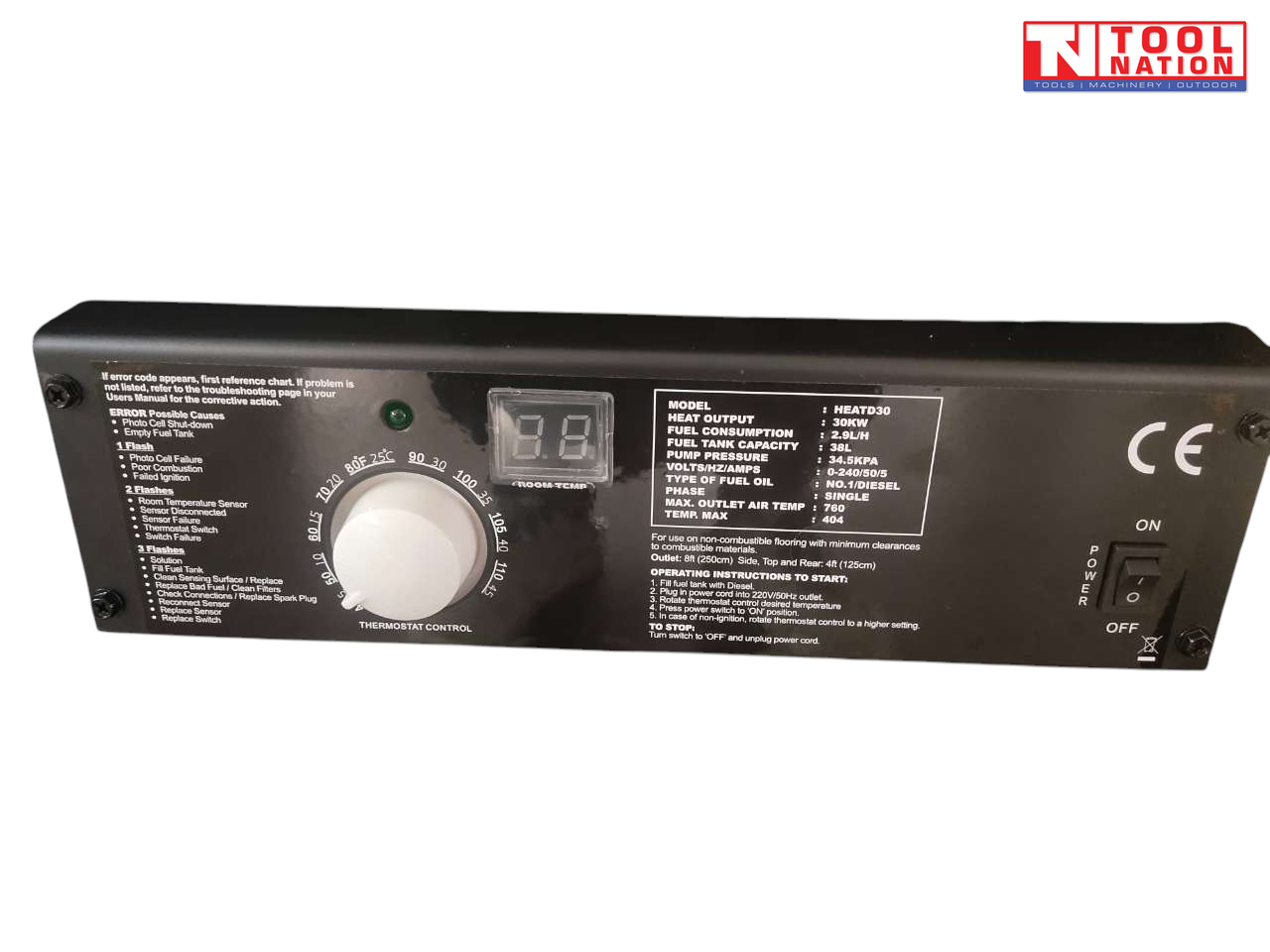 Close-up of the heater control panel with thermostat dial, digital display, specification label, and power switch.