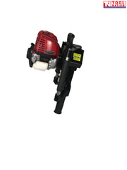 Red, black and white petrol post driver shown from the side with engine housing, side handle, black lower tube, warning label and Tool Nation logo.