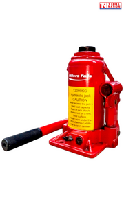 Angled front view of a red hydraulic bottle jack with handle inserted into the side socket.