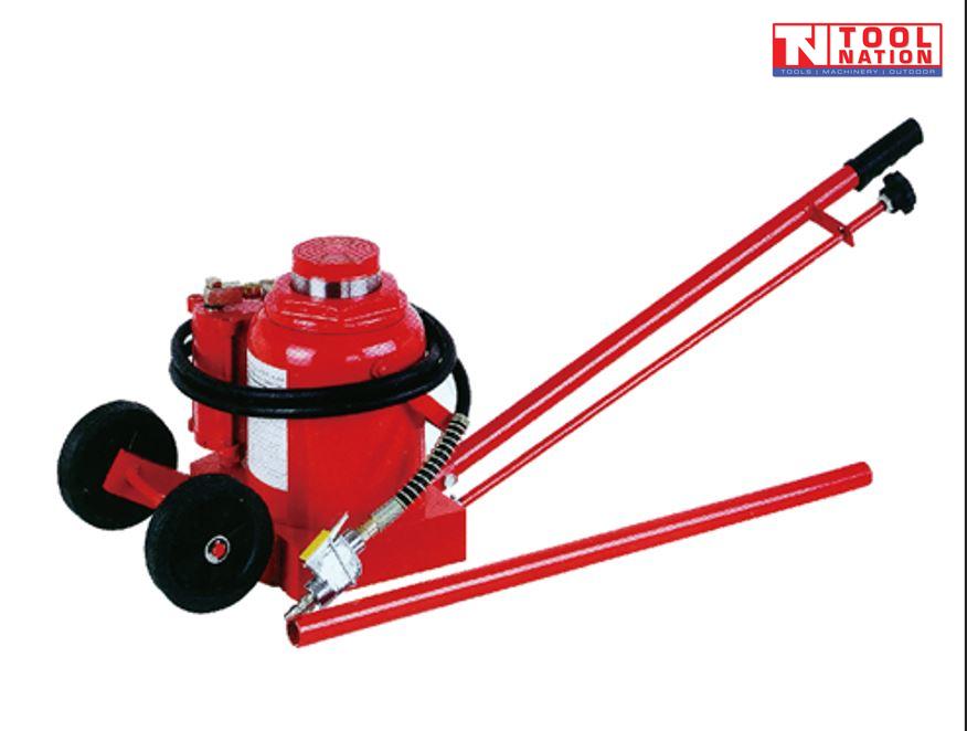 Red air hydraulic truck jack with long handle, black hose, air connector, and rear wheels