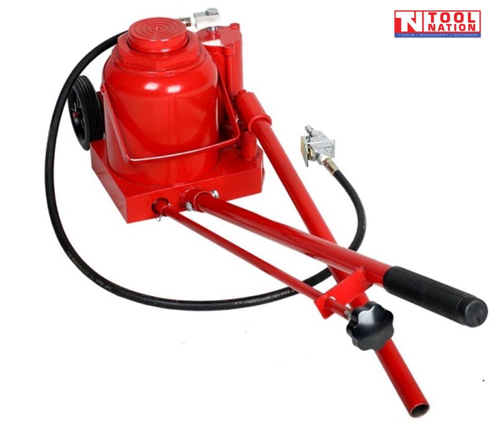 Red air hydraulic truck jack with long handle, black hose, air connector, and rear wheels