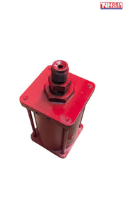 Close-up of red hydraulic pump cylinder with threaded outlet fitting viewed from above