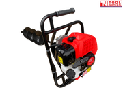Angled rear view of a petrol earth auger showing the red engine cover, black handle frame, white fuel tank, and auger bit extending behind it.