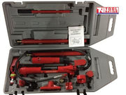 Red hydraulic porta power kit components laid out with pump, hose, extension tubes, handle, and attachments