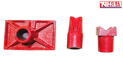 Three red hydraulic attachments including a flat base plate and two V-shaped heads