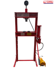 Front view of a red 12 ton shop press with pressure gauge, pressing head, press plates, side cylinder, handle, and yellow foot pedal.