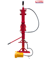 Side view of the red shop press showing the pressure gauge, side cylinder, black hoses, handle, and yellow foot pedal.