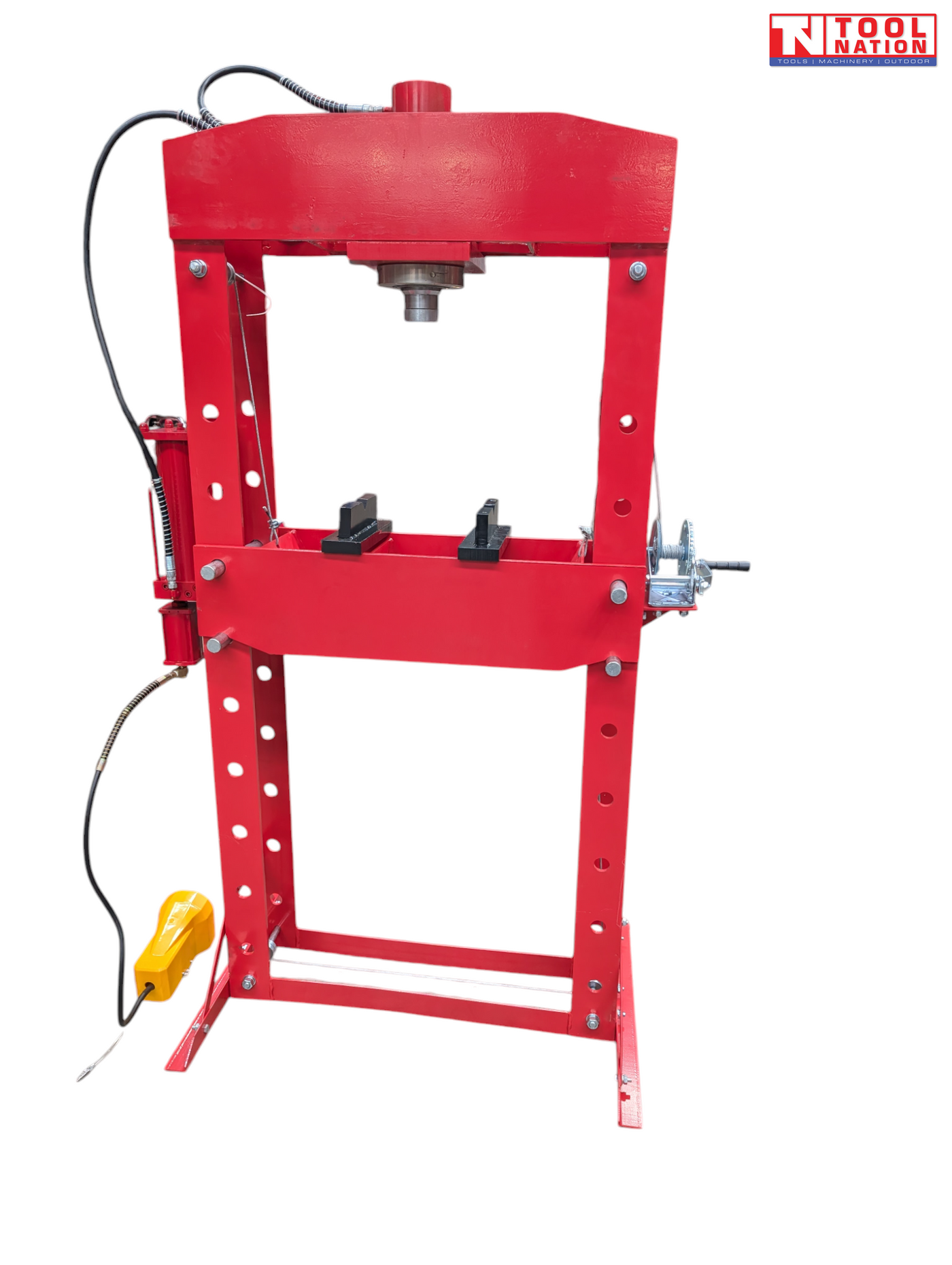 Rear angled view of red shop press with pressing head, press plates, side cylinder, hand winch, hose, and yellow foot pedal