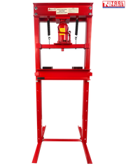 Front view of red shop press with bottle jack, return springs, press plates, and handle on black background
