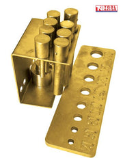 Angled view of gold press adaptor pin kit with pin holder and capacity gauge plate