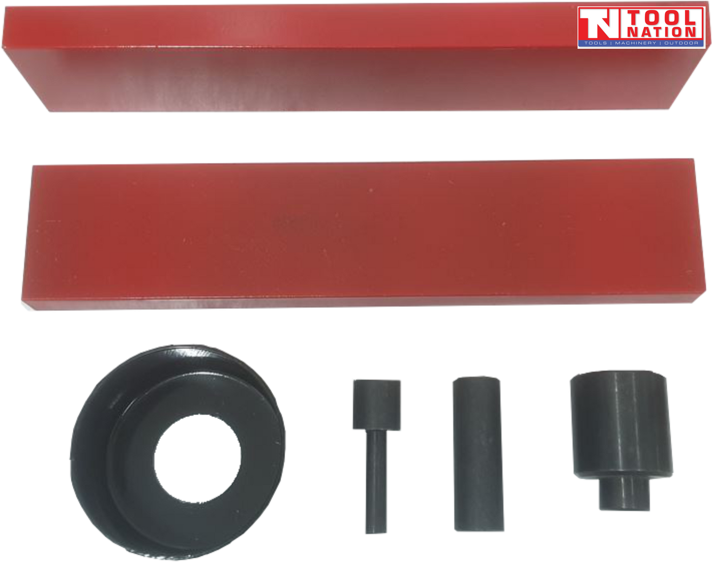 Front view of press accessory kit with two red press plates, three black adaptor pins, and black bearing shield on black background