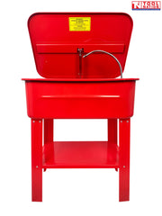 Red parts washer interior view with lid open, flexible hose, removable tray, and yellow warning label