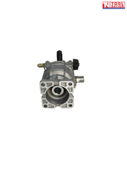 Rear view of a grey and brass pressure washer pump with square mounting plate, central shaft opening, fittings, and a logo in the top right corner.