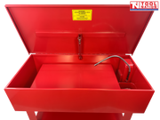 Red parts washer interior view with lid open, flexible hose, raised tray, and yellow warning label