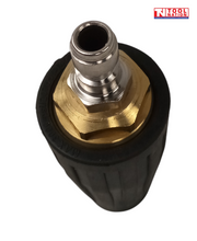 Close-up of the silver quick-connect end and brass fitting on a black turbo nozzle, with a logo in the top right corner.