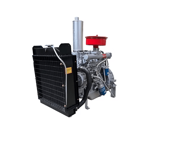 Silver diesel engine shown from the radiator side with a black radiator, red air filter, vertical silver exhaust, blue filters and hoses visible.