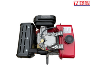 Top view of a red, black and silver diesel engine showing the fuel tank, black exhaust cover, shaft, hoses and Tool Nation logo.