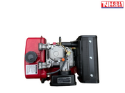 Top view of a red, black and silver diesel engine showing the red fuel tank, black perforated exhaust cover, black air filter cover, hoses and Tool Nation logo.