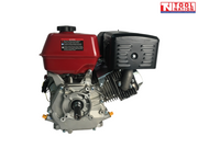 Side view of a red, black and silver petrol engine showing the output shaft, red fuel tank, black exhaust cover, finned engine section and Tool Nation logo.