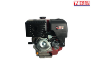 Petrol engine shown from the rear side with black air filter cover, black exhaust cover, silver engine housing, orange cap and Tool Nation logo.