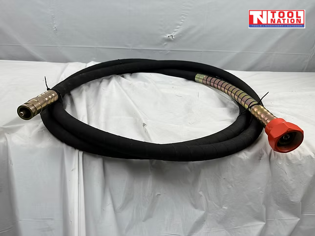Coiled black hose with metal couplings, red connector, and logo in the top corner.