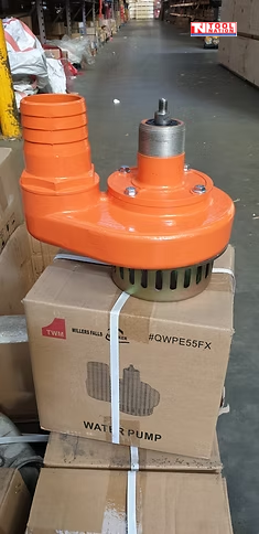Orange pump head with ribbed outlet, metal shaft, bolts, and black lower intake slots on a cardboard box.
