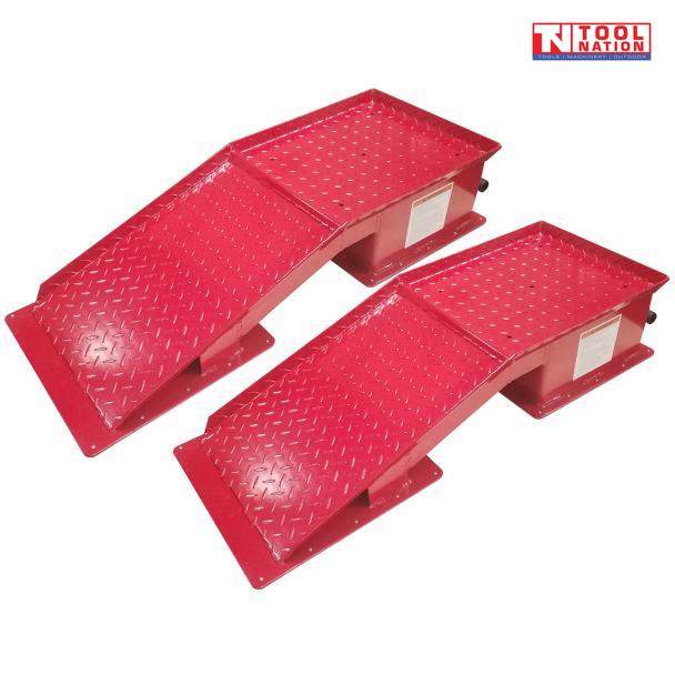 Pair of red steel vehicle ramps with diamond plate surfaces, base plates, side labels and Tool Nation logo.