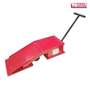 Red steel vehicle ramp shown with diamond plate surface, side label, base plates, raised black T-handle and Tool Nation logo.