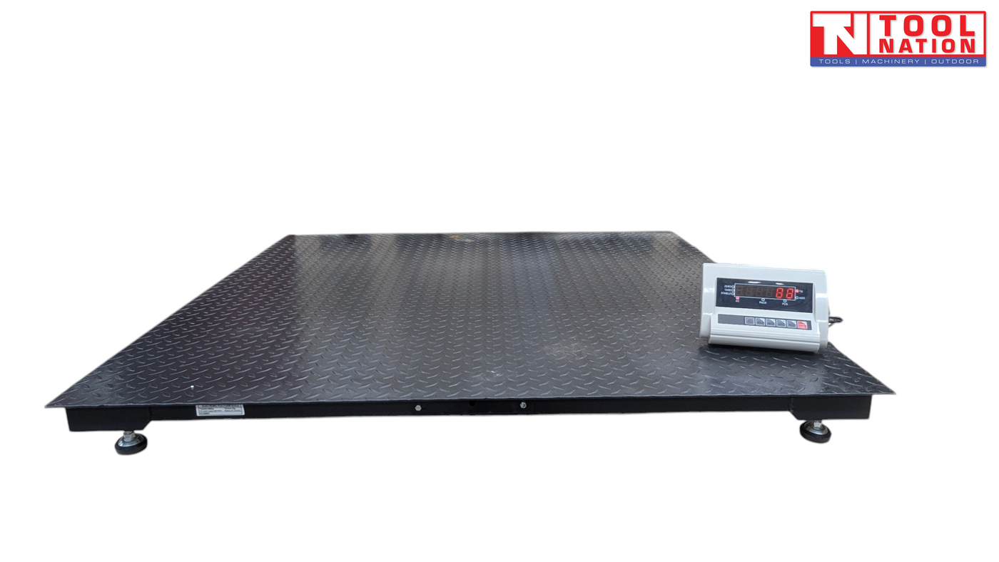 Low-profile platform scale with a textured surface and digital readout on top.