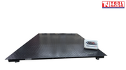 Low-profile platform scale with a textured surface and digital readout on top.