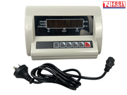 Digital scale display unit shown with a power cord on a white background.