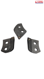 Three dark metal cutter teeth arranged separately with two mounting holes each and worn cutting tips.