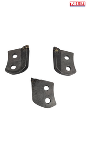 Three dark metal cutter teeth shown from above with two mounting holes each and worn cutting tips.