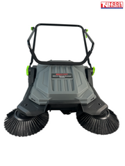Front close-up of a grey and black manual sweeper with two round side brushes, grey top cover, upright handle and Tool Nation logo.