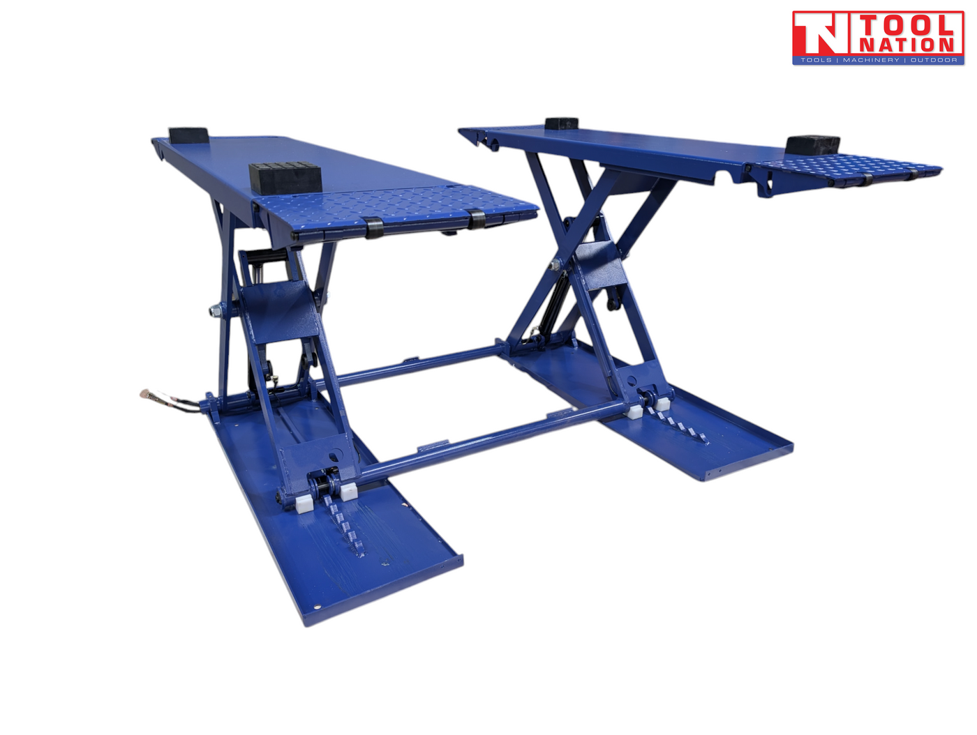 Blue mid-rise car lift with two raised platforms, folded end ramps, black rubber blocks, and a light grey background.