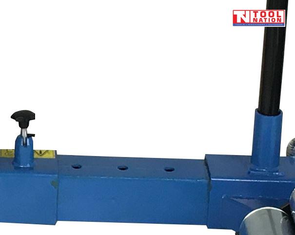 Close-up of blue frame section with adjustment holes, black knob, and upright post