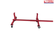 Angled side view of red mobile car axle dolly with extended center beam, upright supports, and caster wheels