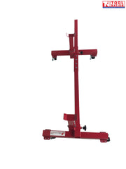 End view of red mobile car axle dolly with two upright support arms, center beam, and caster wheels