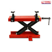 Mini motorcycle scissor lift with black scissor frame and red top platform shown lowered on a light grey background