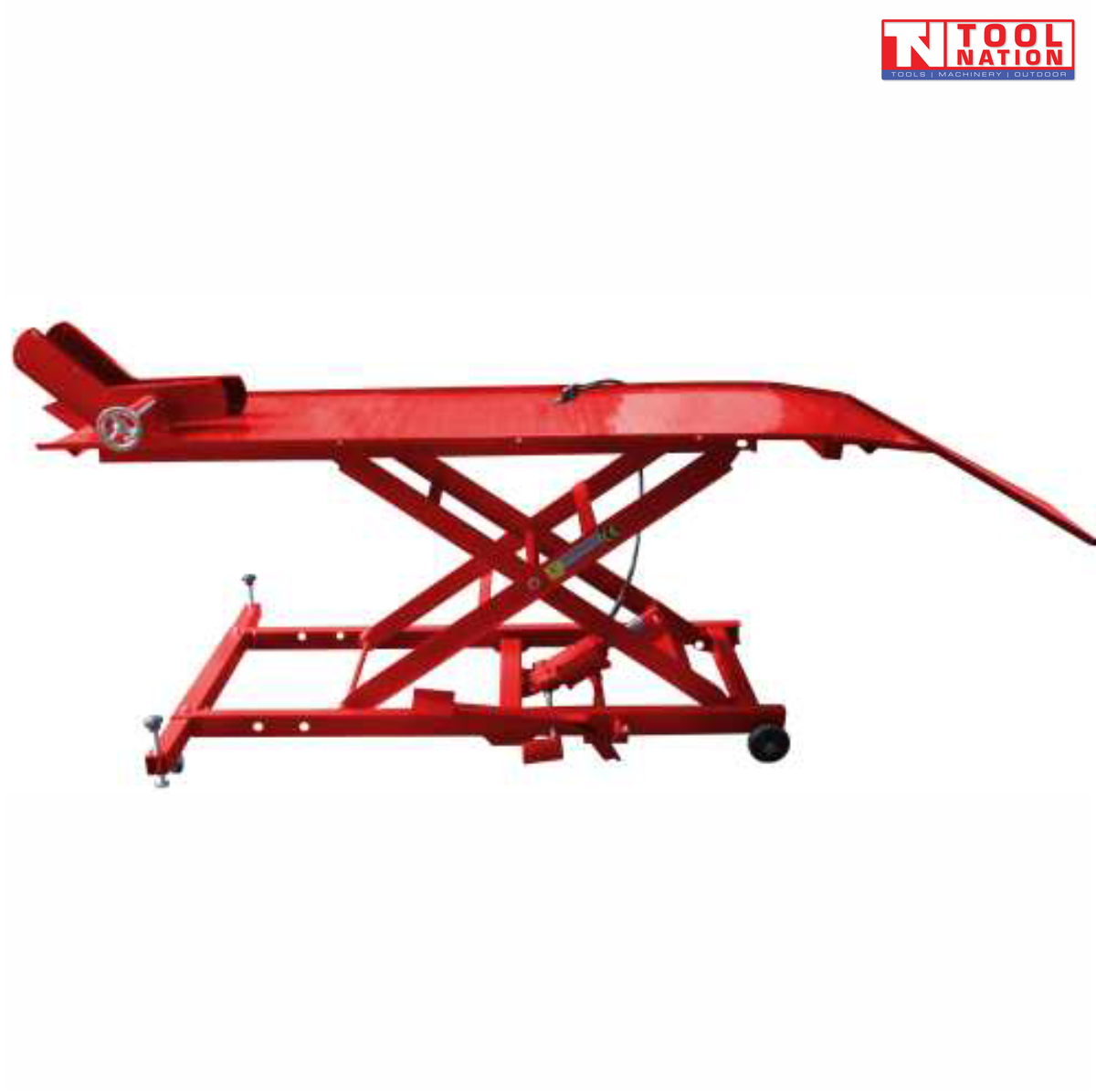Side view of a red motorcycle lift with raised scissor frame, rear loading ramp down, front wheel chock, and base frame with small wheels.