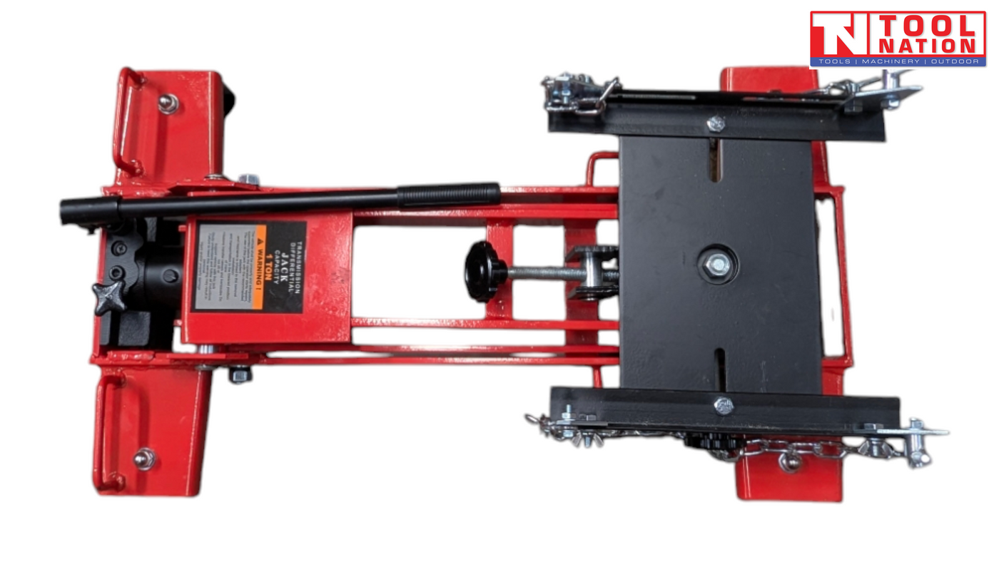 Low side view of red hydraulic floor transmission jack with black saddle plate, safety chains, and handle