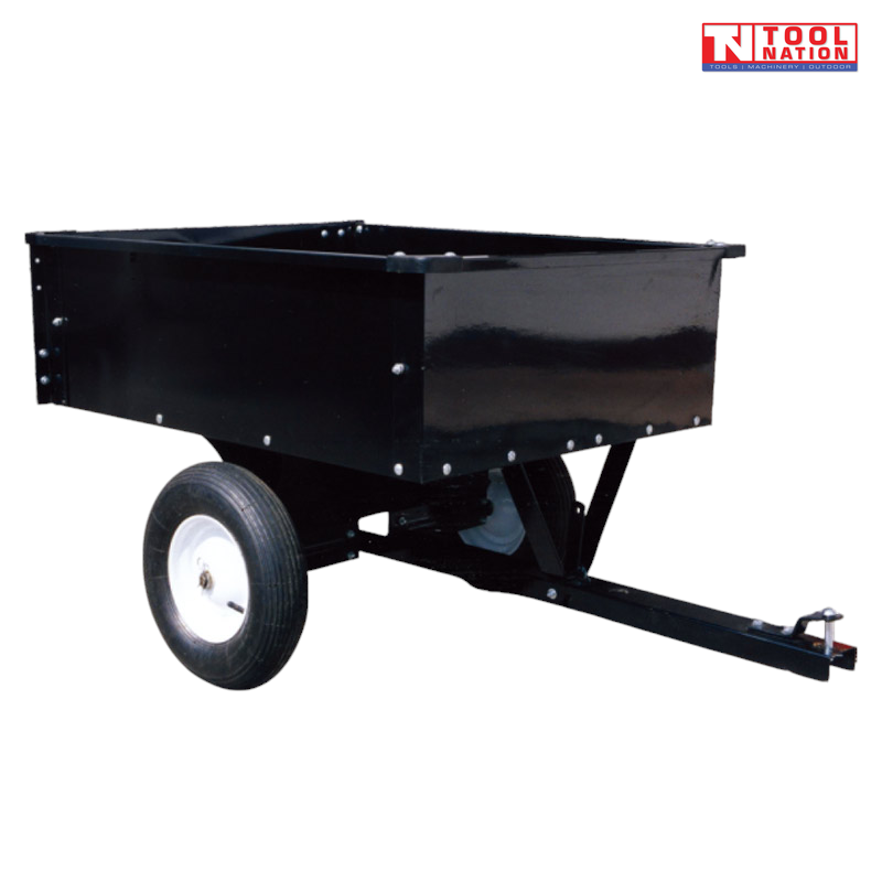 Black tow-behind steel dump cart shown from the front side with an open tray, long drawbar, hitch pin, two treaded tyres and Tool Nation logo.