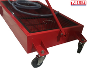 Rear corner close-up of red steel floor oil drainer with caster wheels, black mesh screen, and push handle