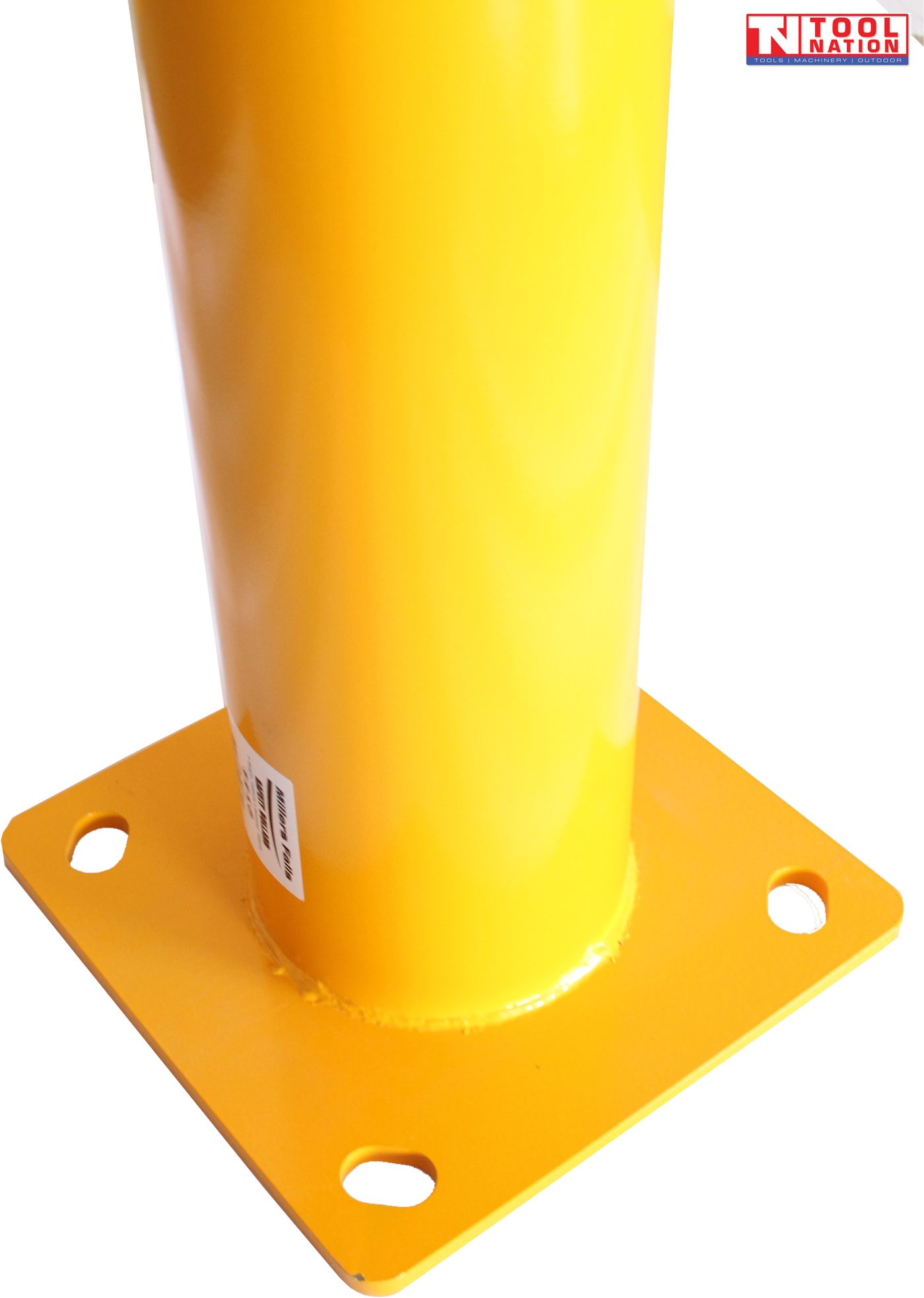 Close-up angled view of a yellow bollard base showing the cylindrical post, square mounting plate, four mounting holes, label and Tool Nation logo.