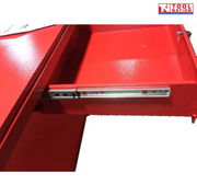 Close-up of red workbench drawer on metal slide