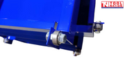 Close-up of blue workbench frame corner showing bolt and washer connection beneath the shelf.