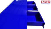 Top-side view of blue steel workbench with three drawers pulled open.
